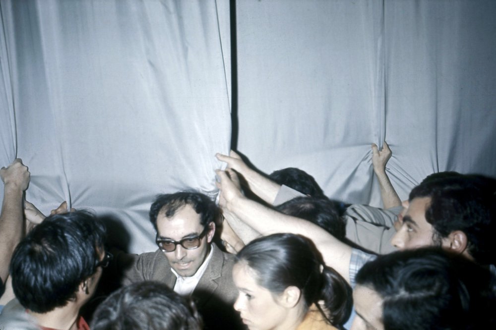 Jean-Luc Godard and Geraldine Chaplin in the middle of the 1968 protests at the Palais that shut down the festival that year.