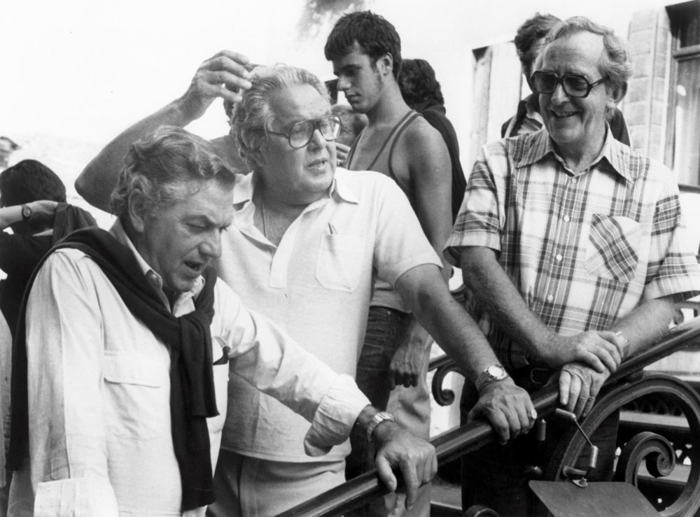 Left to right: Adam, producer Albert Broccoli and director Lewis Gilbert on the set of Moonraker