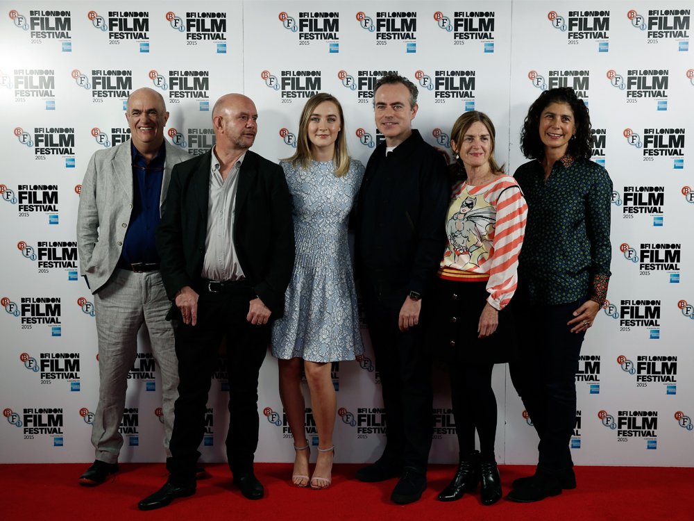 Novelist Colm Tóibín, screenwriter Nick Hornby, actor Saoirse Ronan, director John Crowley and producers Finola Dwyer and Amanda Posey attend the Brooklyn photocall during the BFI London Film Festival