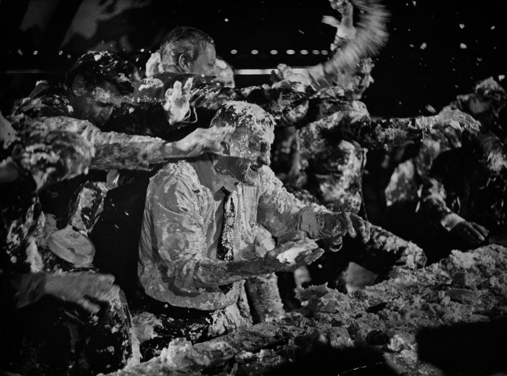 George C. Scott in the middle of the unused custard pie fight scene from Dr. Strangelove (1963).