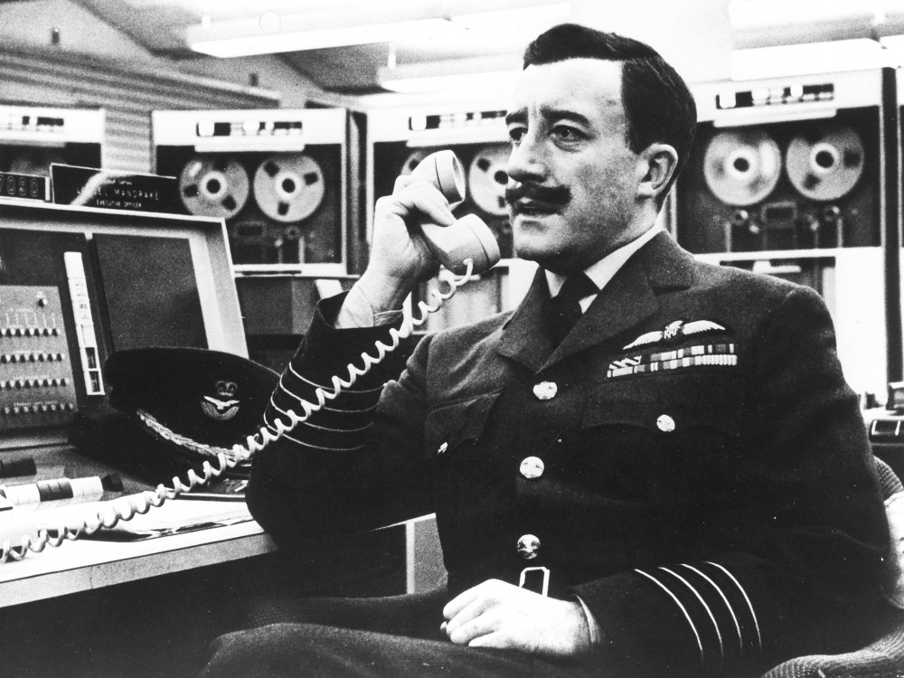 Peter Sellers as Group Captain Lionel Mandrake in Dr Strangelove or: How I Learned to Stop Worrying and Love the Bomb