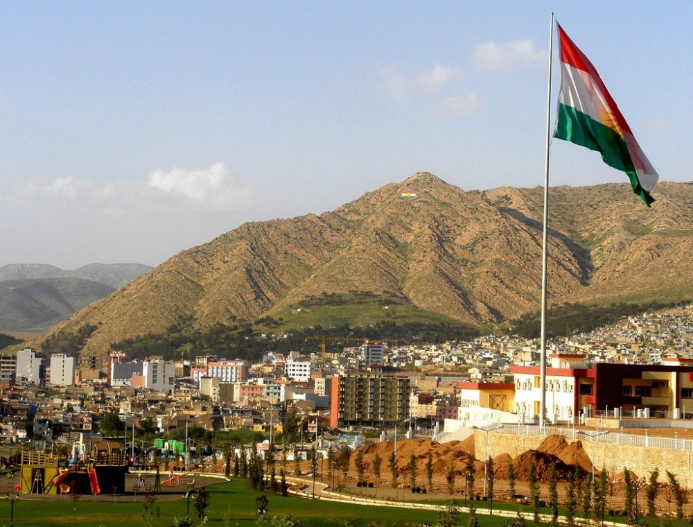 The Kurdish flag flies over Duhok, capital of the northernmost governorate of the Kurdistan Region of Iraq