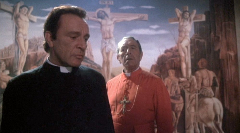 Richard Burton as Father Lamont (left) in Exorcist II: The Heretic