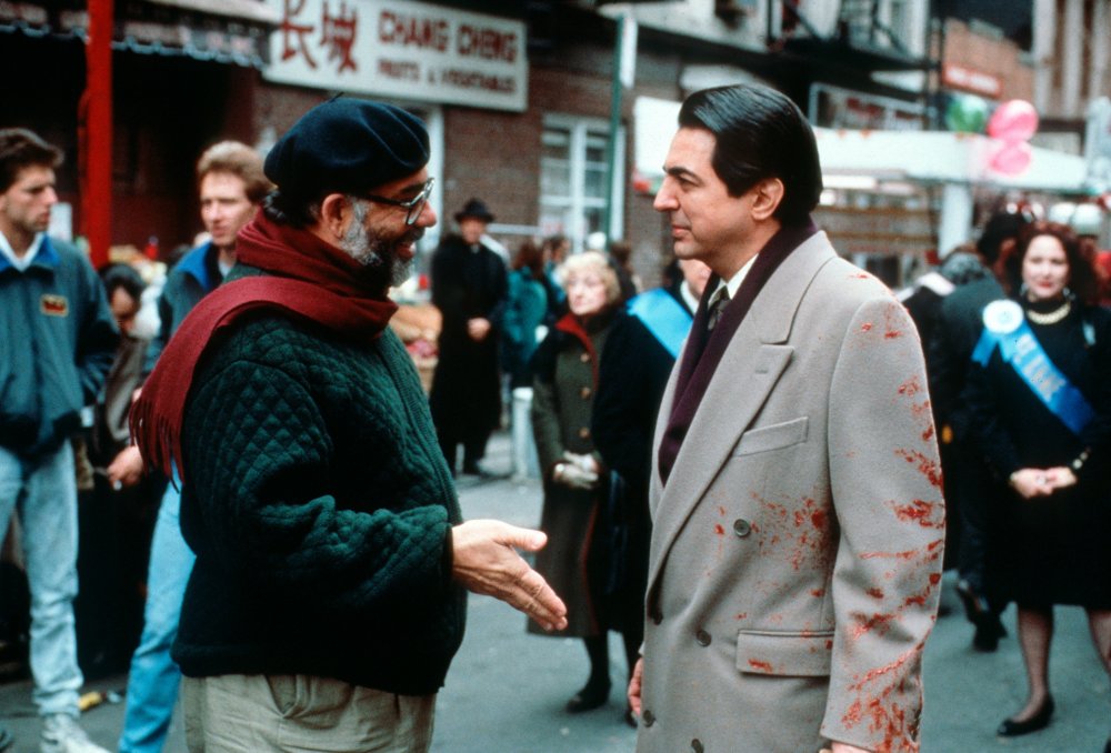 Joe Mantegna (left) as the fated Joey Zasa, sharing a convivial moment with his director between shots