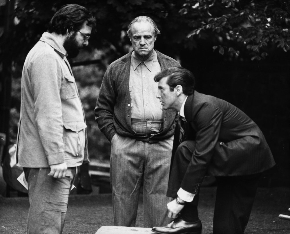 Coppola and Brando with Al Pacino as Michael Corleone, who finds himself drawn inexorably into his father&amp;#8217;s murky life of organised crime