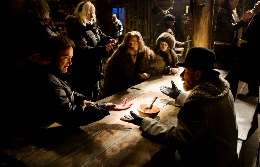 Quentin Tarantino directing Tim Roth and company on the set of The Hateful Eight (2015)