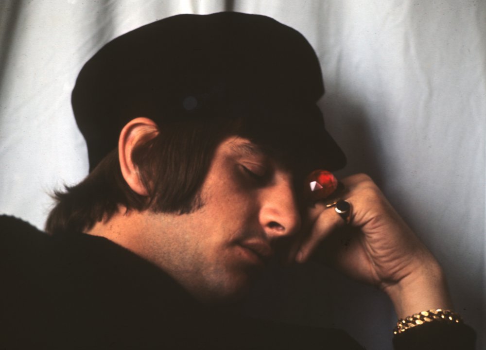 Ringo Starr wearing the sacrificial ring that sets the plot in motion after Ringo accepts it as a gift from a fan, unaware that it belongs to a religious cult