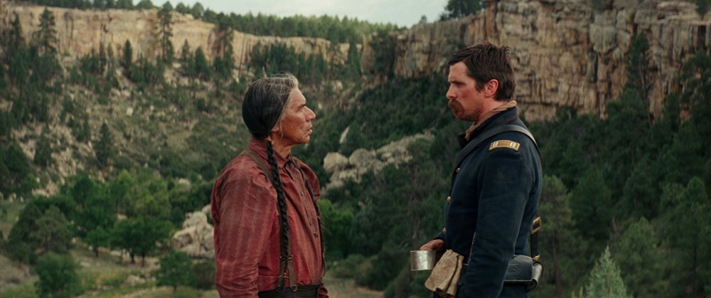 Wes Studi as Chief Yellow Hawk and Christian Bale as Captain Joseph J. Blocker in Scott Cooper&amp;rsquo;s Hostiles