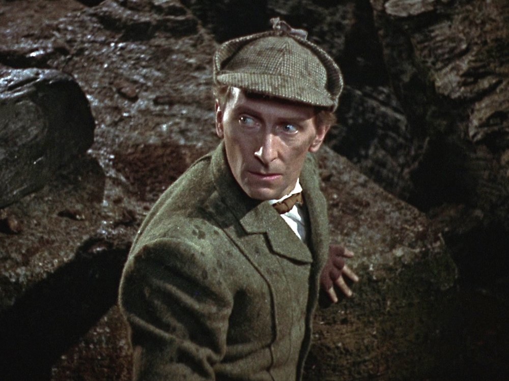 Peter Cushing, the most prolific British male actor of the 1970s, playing Sherlock Holmes, the third most featured character, in The Hound of the Baskervilles (1959)