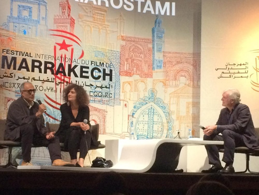 Kiarostami and Geoff Andrew on stage at the Marrakech Film Festival