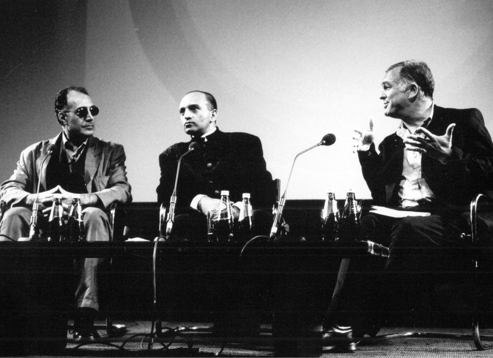 Abbas Kiarostami (left) interviewed by Geoff Andrew (right) with an interpreter at the National Film Theatre (now BFI Southbank) in 1999