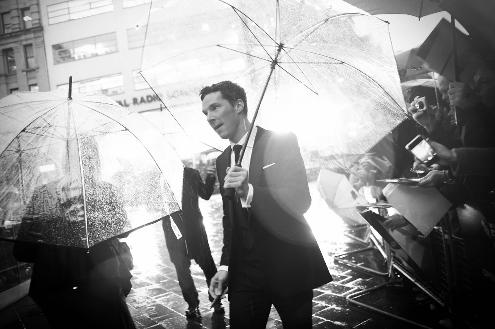 Suave and debonair despite the rain, man of the moment Benedict Cumberbatch kept hoards of fans entertained in the rain after his arrival to our Opening Night gala screening of Enigma-code-cracking drama The Imitation Game