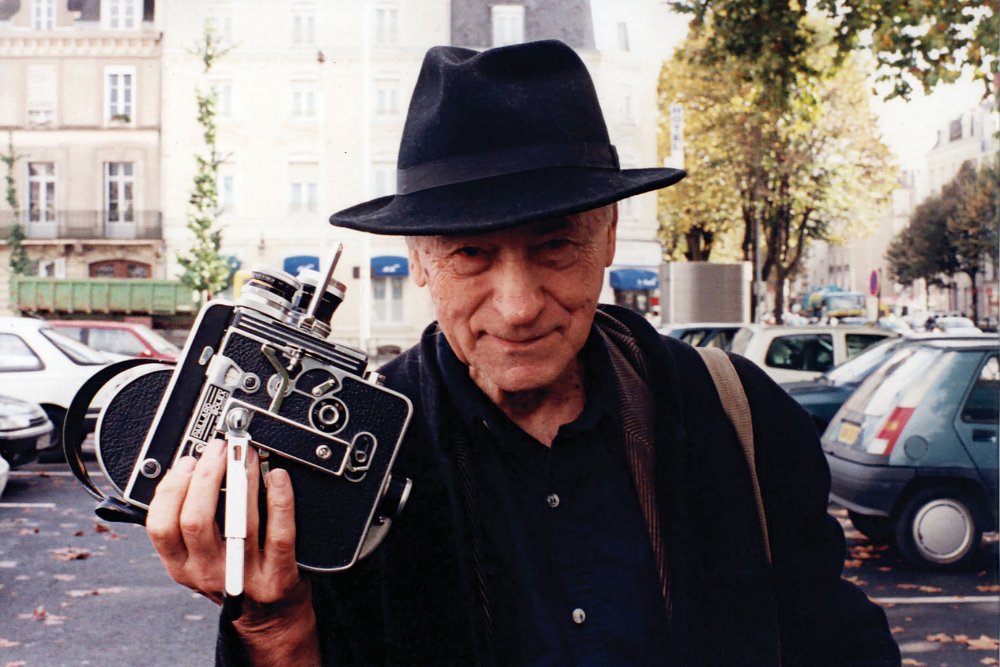 Jonas Mekas with his Bolex camera