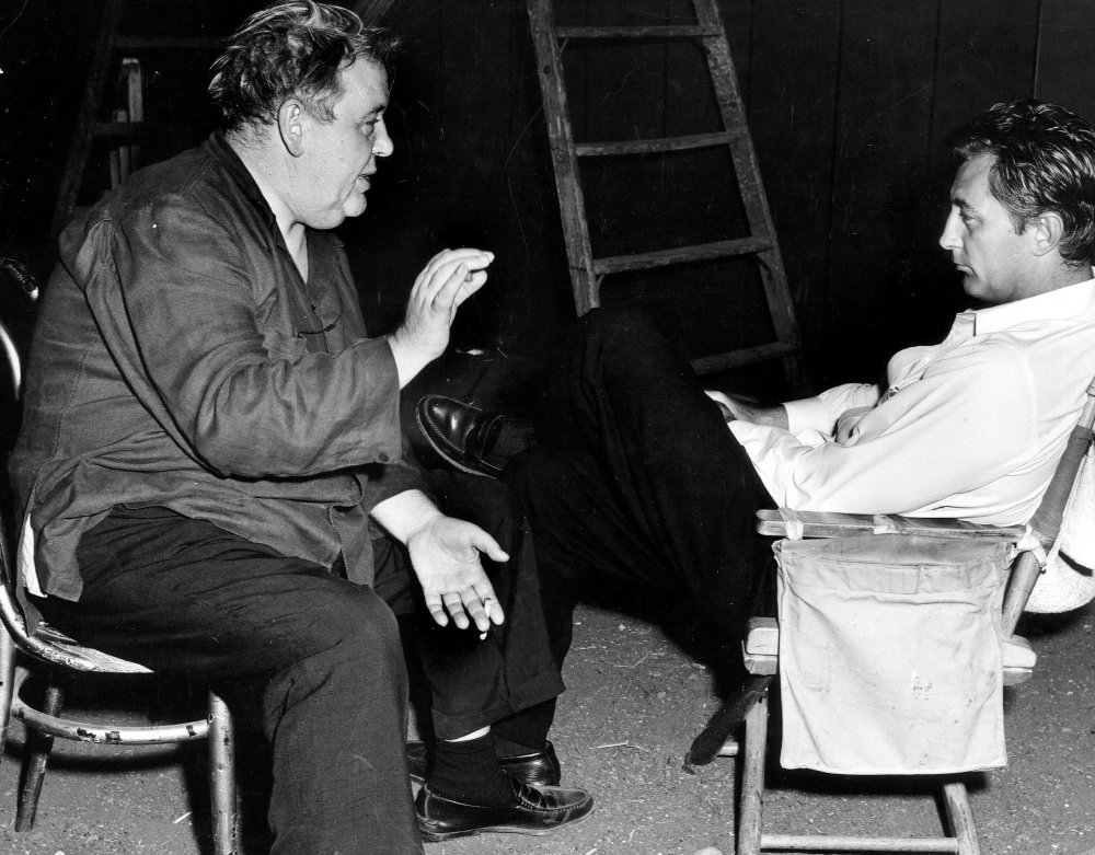 Charles Laughton chats with Robert Mitchum between takes. Although clearly a natural in the director&amp;#8217;s chair, after the critical and box-office failure of The Night of the Hunter, Laughton would never again make a film.
