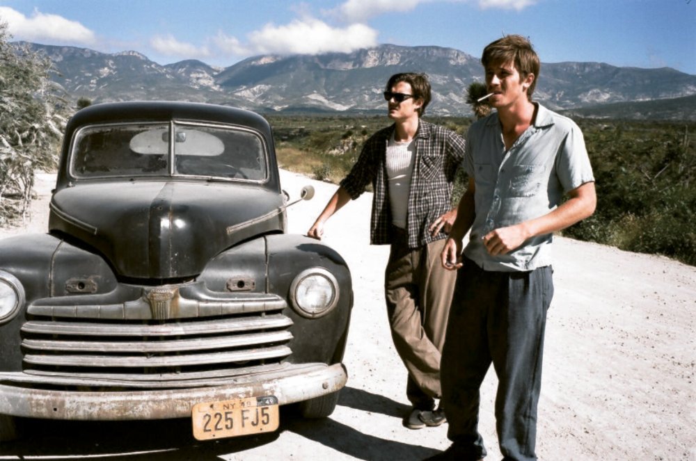 Garrett Hedlund as Dean Moriarty, front, with Sam Riley as Sal Paradise