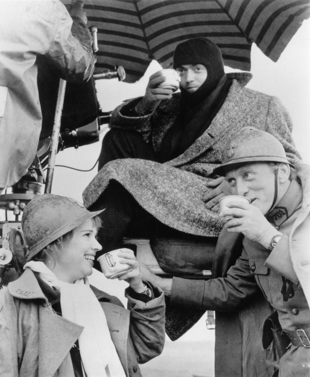 Christiane and Stanley Kubrick with Kirk Douglas (right) on location for Paths of Glory (1957)