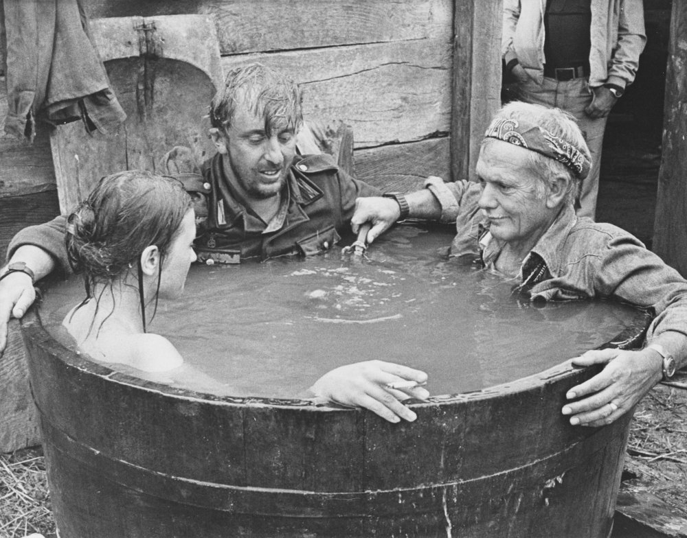 Sam Peckinpah and cast members on the set of Cross of Iron (1977)