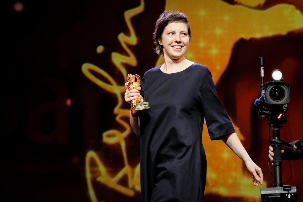 Adina Pintile with her Golden Bear for Best Film for Touch Me Not