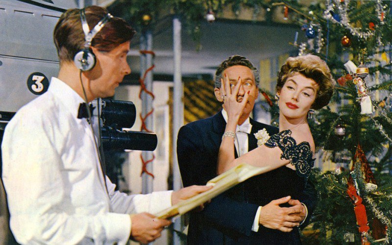 Peter Finch (centre) and Kay Kendall (right) in Simon and Laura (1955)