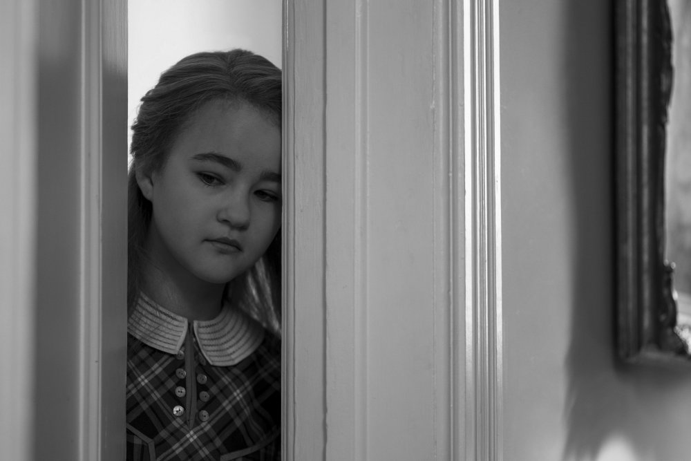 Millicent Simmonds as the young Rose