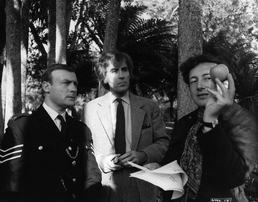 Actors Edward Woodward and Christopher Lee and director Robin Hardy filming The Wicker Man (1973)