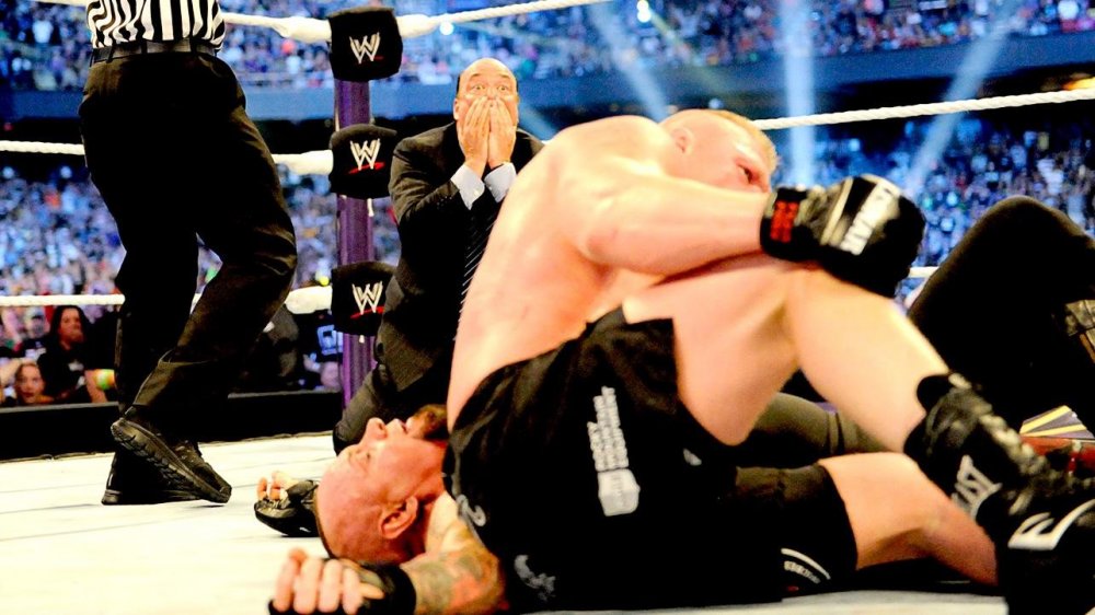 Brock Lesnar (above) trumps The Undertaker