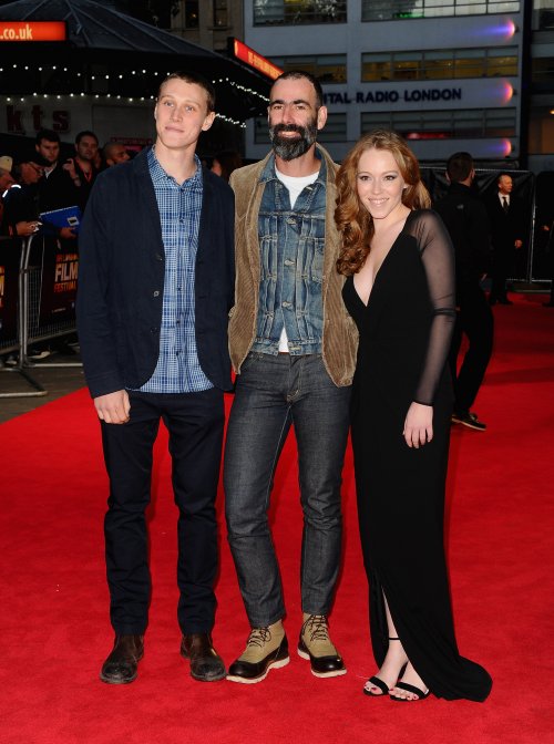 Actors George Mackay and Charlotte Spencer and director Duane Hopkins (centre) attend the red carpet arrivals of Bypass during the 58th BFI London Film Festival