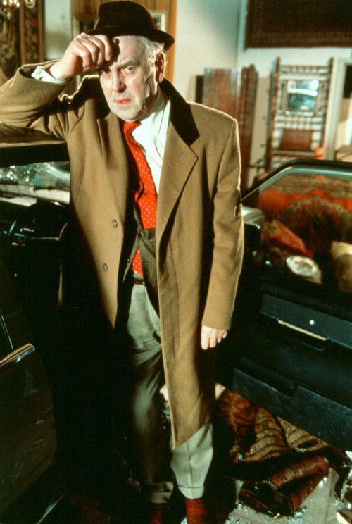 George Cole as Arthur Daley in Minder (1979-1994)